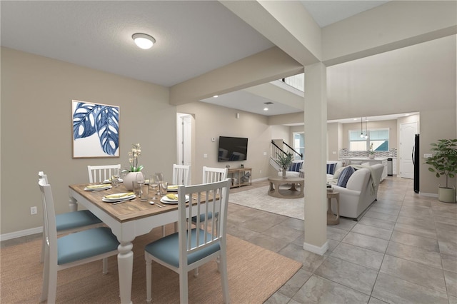15019 Valverse Aly, Winter Garden, FL 34787 - dining area with baseboards and light tile patterned floors