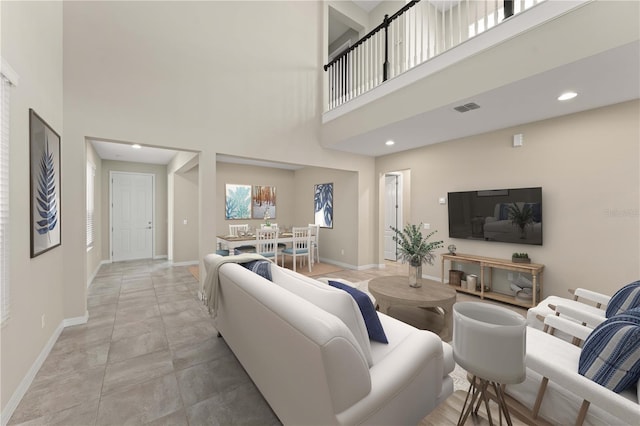 15019 Valverse Aly, Winter Garden, FL 34787 - living area featuring a high ceiling and recessed lighting