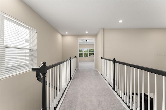 15019 Valverse Aly, Winter Garden, FL 34787 - hallway with light carpet, recessed lighting, and an upstairs landing