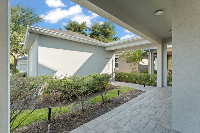 15019 Valverse Aly, Winter Garden, FL 34787 - view of exterior entry with stucco siding