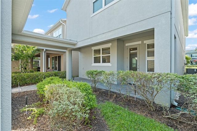 15019 Valverse Aly, Winter Garden, FL 34787 - entrance to property featuring stucco siding and a porch