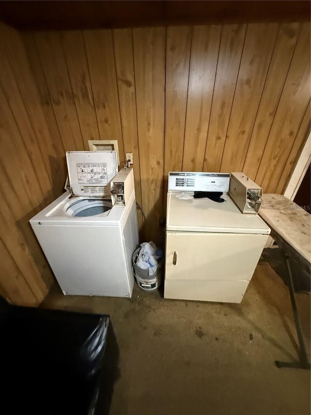 1425 26th St, Orlando, FL 32805 - laundry room with wood walls and washing machine and clothes dryer