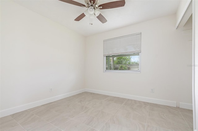 323 Scotland Dr, Daytona Beach, FL 32117 - spare room with baseboards and a ceiling fan