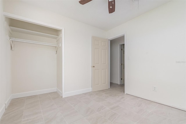 323 Scotland Dr, Daytona Beach, FL 32117 - unfurnished bedroom with a ceiling fan and a closet