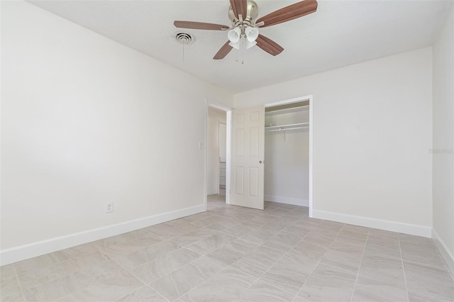 323 Scotland Dr, Daytona Beach, FL 32117 - unfurnished bedroom featuring a closet and ceiling fan
