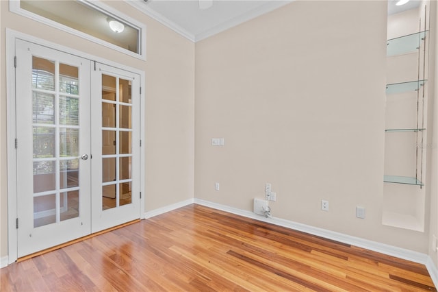 875 Bentley Green Cir, Winter Springs, FL 32708 - spare room with ornamental molding, wood finished floors, and french doors