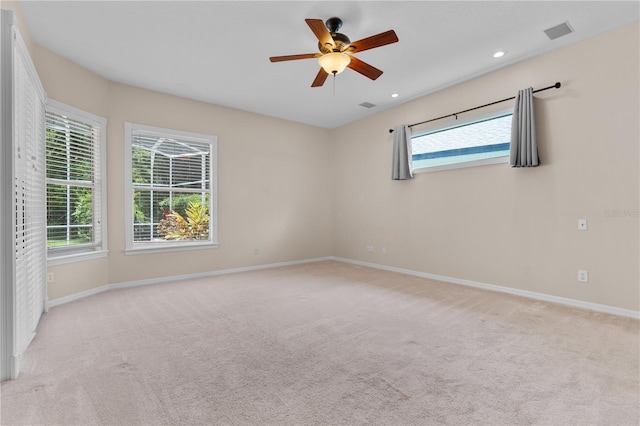 875 Bentley Green Cir, Winter Springs, FL 32708 - empty room featuring healthy amount of natural light, light carpet, a ceiling fan, and recessed lighting