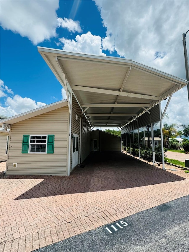 1115 Deer Creek Blvd, Davenport, FL 33837 - view of parking / parking lot with a carport