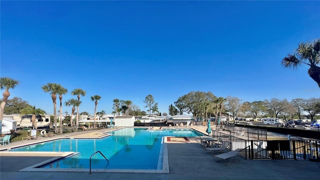 1115 Deer Creek Blvd, Davenport, FL 33837 - community pool with a patio area