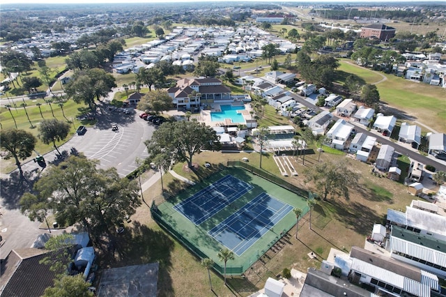 1115 Deer Creek Blvd, Davenport, FL 33837 - aerial view of property and surrounding area featuring a pool area and nearby suburban area