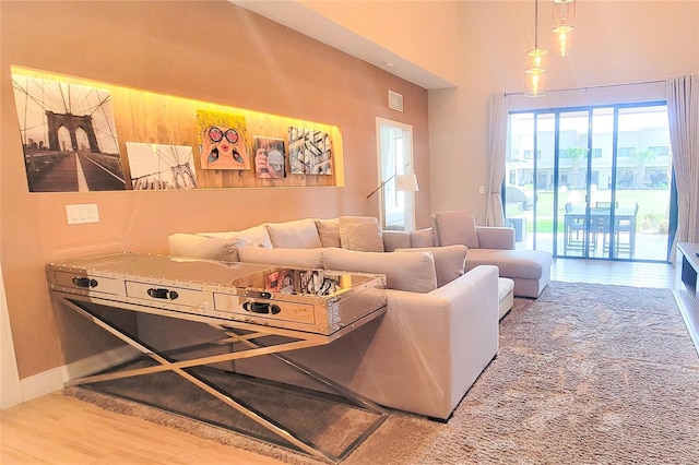 7478 Brooklyn Dr, Kissimmee, FL 34747 - living area with wood finished floors and a towering ceiling