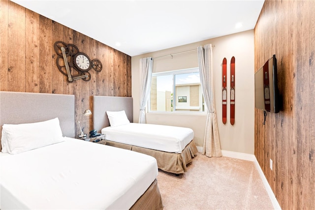 7478 Brooklyn Dr, Kissimmee, FL 34747 - bedroom featuring wooden walls and light colored carpet