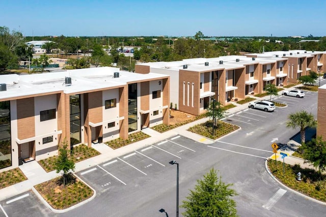 7478 Brooklyn Dr, Kissimmee, FL 34747 - view of building exterior featuring uncovered parking