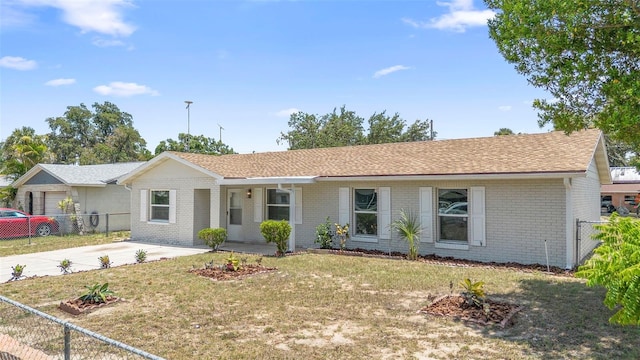 105 E Magnolia St, Davenport, FL 33837 - single story home with brick siding and driveway