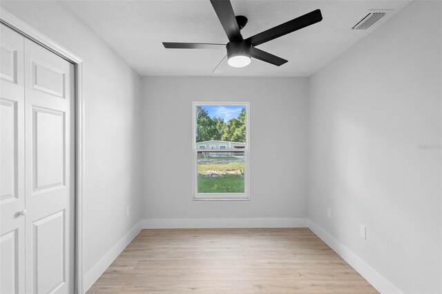 105 E Magnolia St, Davenport, FL 33837 - spare room featuring ceiling fan and light wood-style flooring