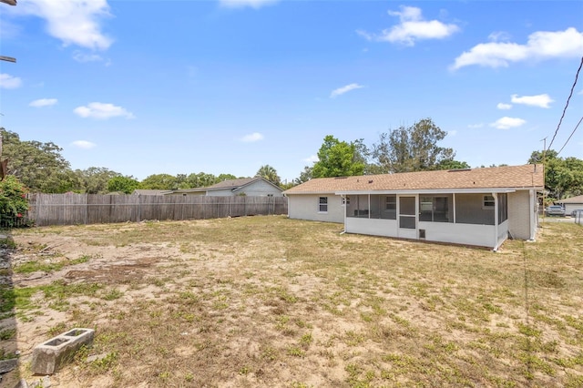 105 E Magnolia St, Davenport, FL 33837 - back of property featuring a sunroom