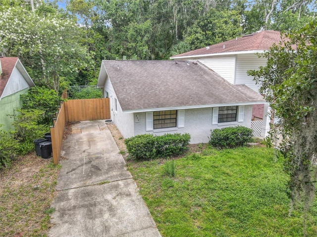 809 Sugar House Blvd, Port Orange, FL 32129 - view of front of house with roof with shingles, stucco siding, and concrete driveway