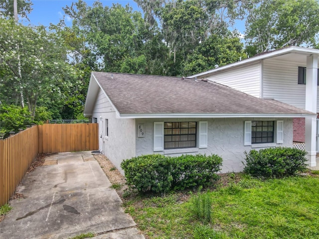 809 Sugar House Blvd, Port Orange, FL 32129 - view of front of property featuring a shingled roof and stucco siding