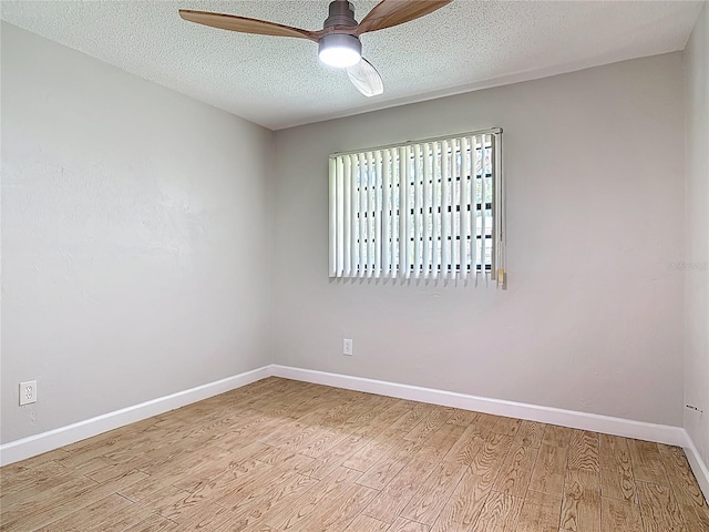 809 Sugar House Blvd, Port Orange, FL 32129 - empty room with a ceiling fan, light wood-type flooring, and a textured ceiling