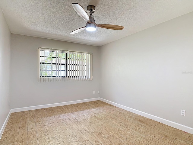809 Sugar House Blvd, Port Orange, FL 32129 - spare room with ceiling fan, light wood-type flooring, and a textured ceiling
