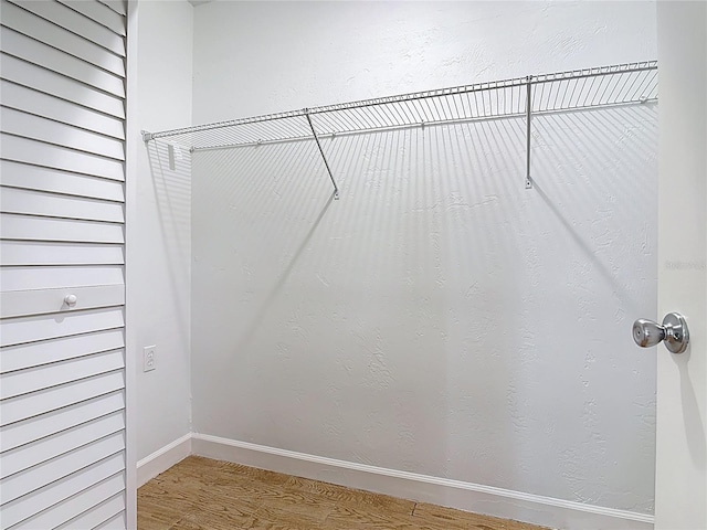 809 Sugar House Blvd, Port Orange, FL 32129 - walk in closet featuring wood finished floors