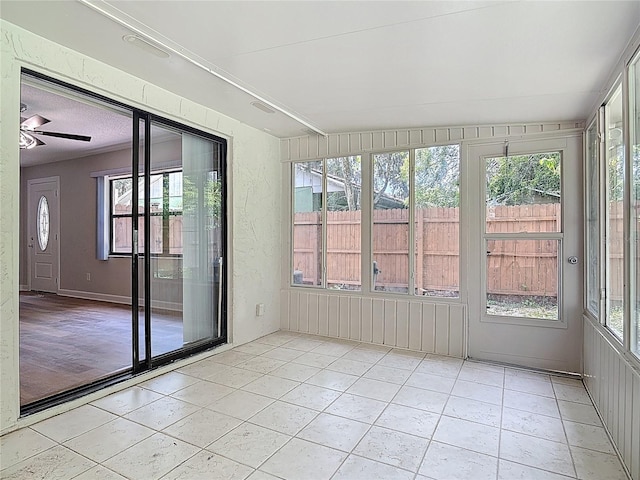 809 Sugar House Blvd, Port Orange, FL 32129 - unfurnished sunroom featuring ceiling fan and tile patterned flooring