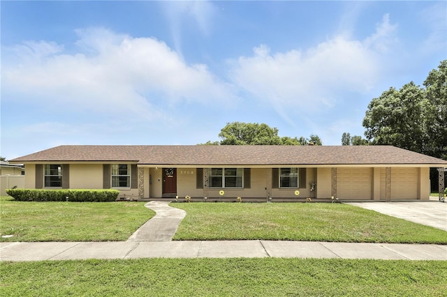 2908 Clear Way, Orlando, FL 32805 - ranch-style house featuring an attached garage, a front yard, and concrete driveway