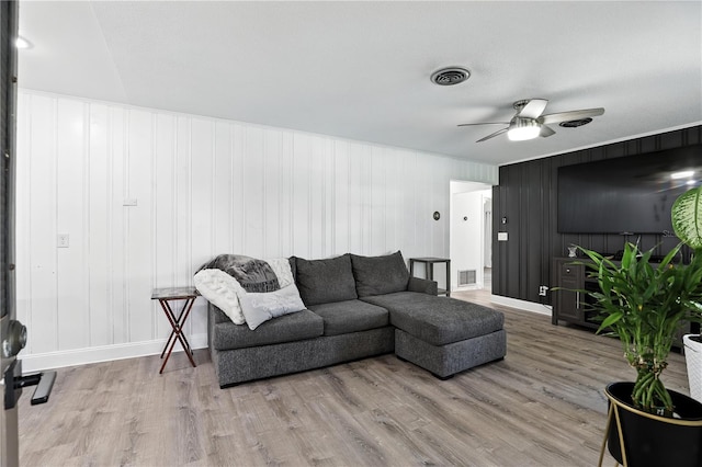 2908 Clear Way, Orlando, FL 32805 - living area with light wood-style floors and a ceiling fan