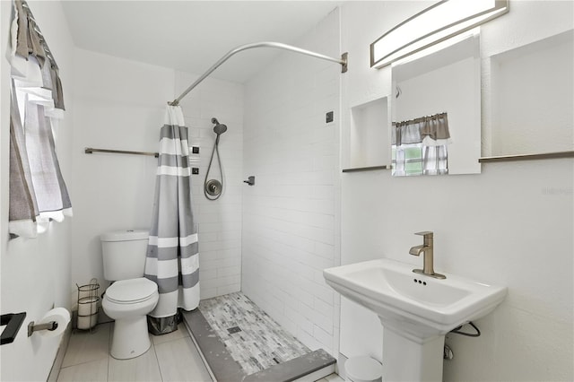2908 Clear Way, Orlando, FL 32805 - bathroom with a stall shower and tile patterned floors