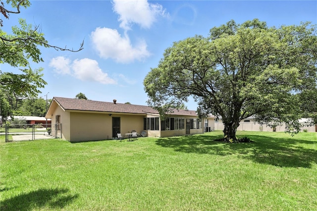 2908 Clear Way, Orlando, FL 32805 - rear view of property with stucco siding
