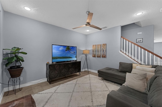8968 Hildreth Ave, Orlando, FL 32832 - living room featuring stairs, a ceiling fan, and recessed lighting
