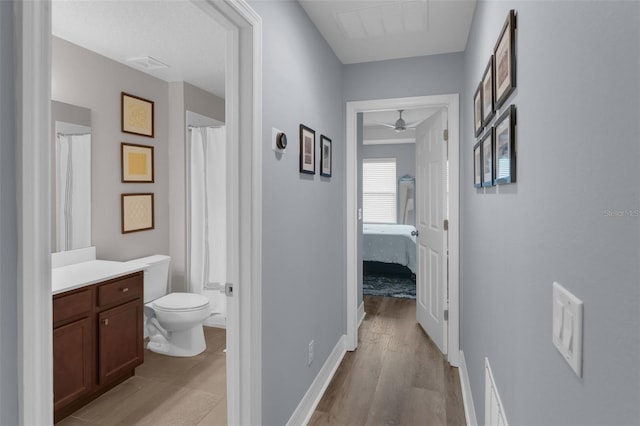 8968 Hildreth Ave, Orlando, FL 32832 - hall with light wood finished floors and baseboards
