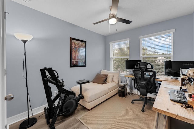 8968 Hildreth Ave, Orlando, FL 32832 - office area with wood finished floors and a ceiling fan