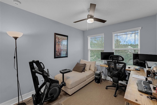 8968 Hildreth Ave, Orlando, FL 32832 - home office featuring ceiling fan and wood finished floors