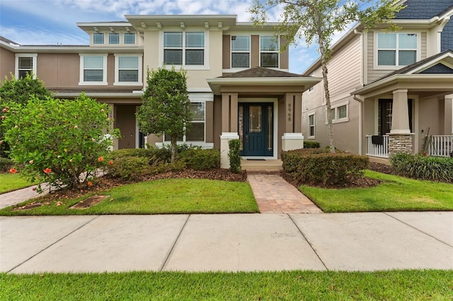 8968 Hildreth Ave, Orlando, FL 32832 - view of front facade with stucco siding