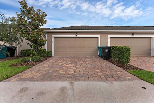 8968 Hildreth Ave, Orlando, FL 32832 - garage featuring decorative driveway