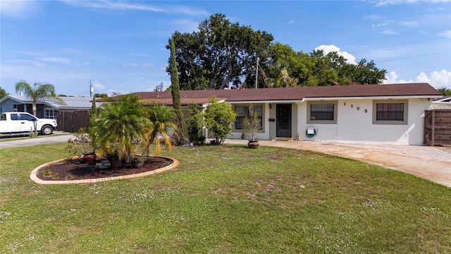 1105 Arrowsmith Ave, Orlando, FL 32809 - ranch-style home featuring stucco siding and concrete driveway