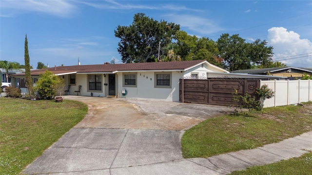 1105 Arrowsmith Ave, Orlando, FL 32809 - ranch-style home featuring concrete driveway and stucco siding