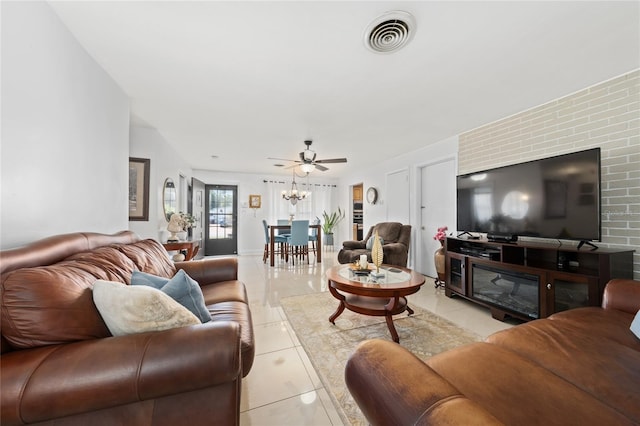 1105 Arrowsmith Ave, Orlando, FL 32809 - living room with light tile patterned flooring and a ceiling fan