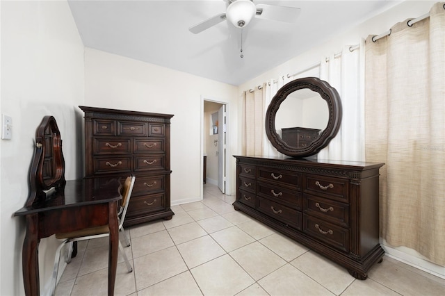 1105 Arrowsmith Ave, Orlando, FL 32809 - bedroom with a ceiling fan and light tile patterned floors