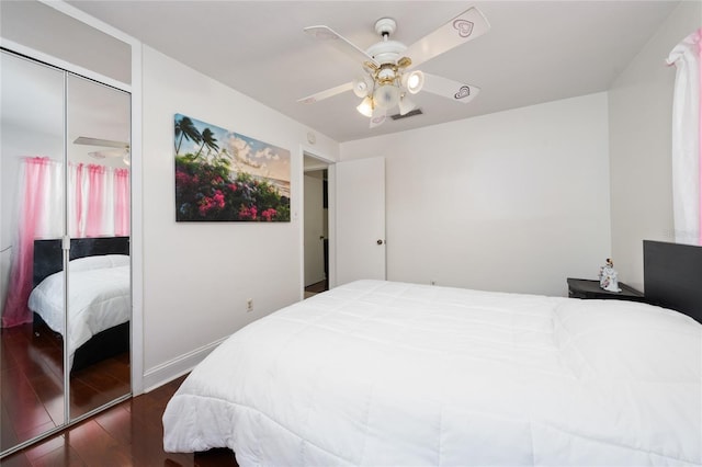 1105 Arrowsmith Ave, Orlando, FL 32809 - bedroom featuring wood finished floors, a closet, and ceiling fan