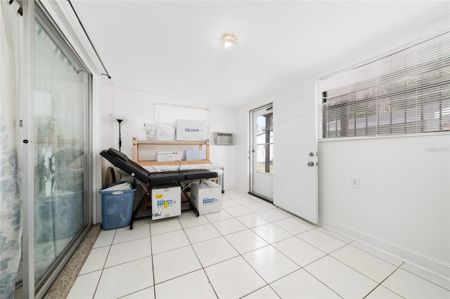 1105 Arrowsmith Ave, Orlando, FL 32809 - foyer featuring light tile patterned floors and a wall mounted air conditioner