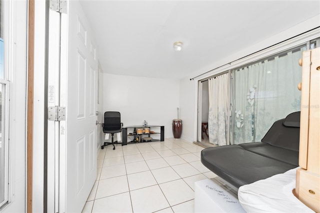 1105 Arrowsmith Ave, Orlando, FL 32809 - living room featuring light tile patterned floors