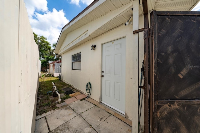 1105 Arrowsmith Ave, Orlando, FL 32809 - entrance to property featuring stucco siding