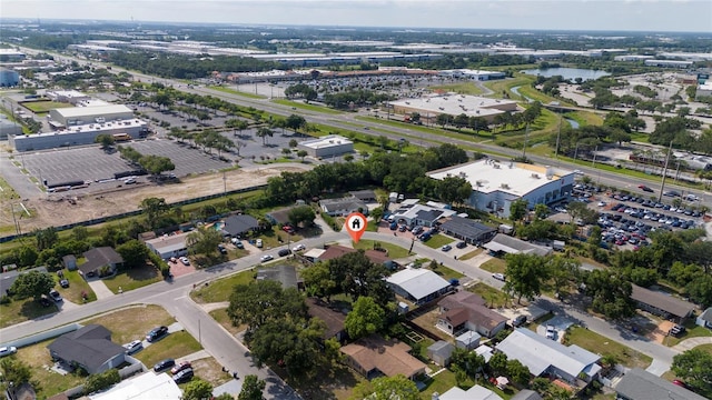 1105 Arrowsmith Ave, Orlando, FL 32809 - aerial view of property and surrounding area featuring a nearby body of water