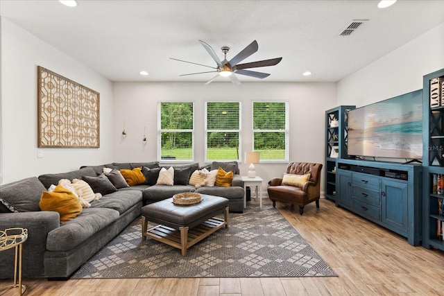 31924 Geoff, Sorrento, FL 32776 - living area with a ceiling fan, healthy amount of natural light, light wood finished floors, and recessed lighting