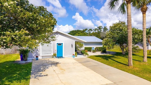 2356 Date Palm Dr, Edgewater, FL 32141 - view of front of property featuring a front lawn and driveway