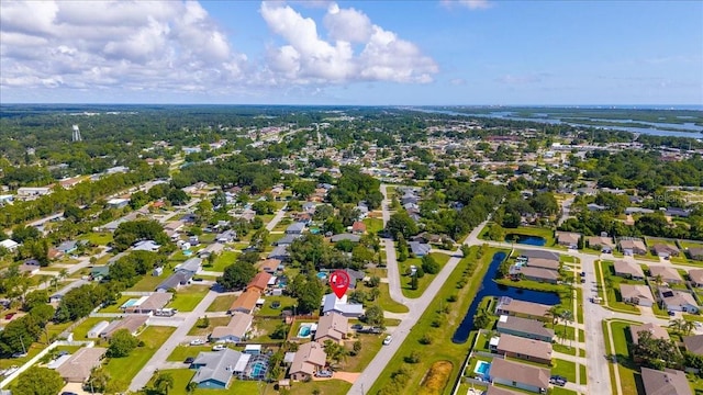 2356 Date Palm Dr, Edgewater, FL 32141 - aerial overview of property's location featuring a large body of water and nearby suburban area