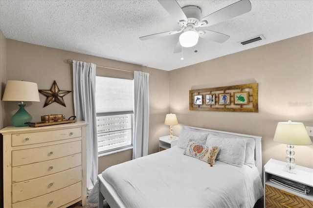 2356 Date Palm Dr, Edgewater, FL 32141 - bedroom featuring a textured ceiling and a ceiling fan