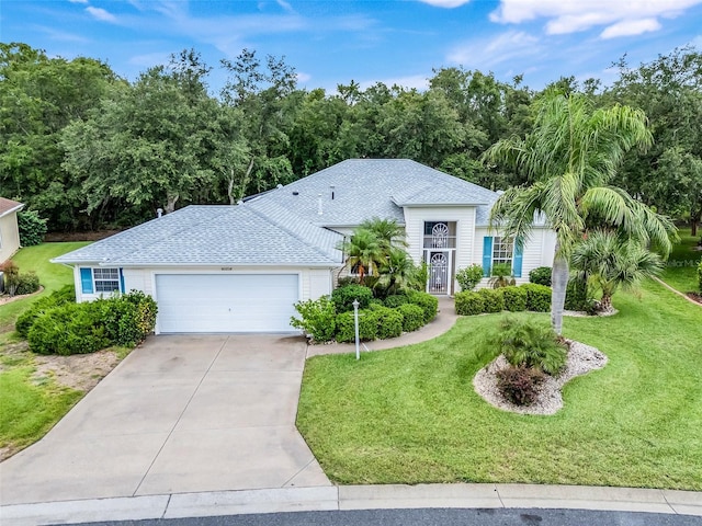 20542 Queen Alexandra Dr, Leesburg, FL 34748 - single story home with a garage, a front yard, and driveway